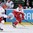 OSTRAVA, CZECH REPUBLIC - MAY 5: Denmark's Julian Jakobsen #33 stickhandles the puck up ice with Belarus' Ilya Shinkevich #8 chasing during preliminary round action at the 2015 IIHF Ice Hockey World Championship. (Photo by Andrea Cardin/HHOF-IIHF Images)

